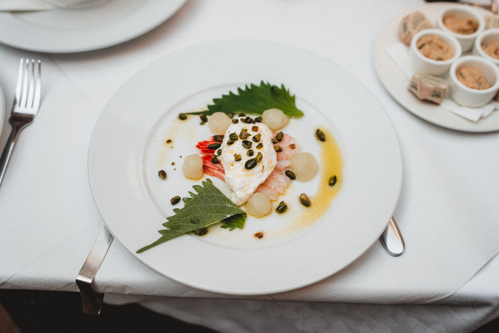 Ama Ebi prawns, stracciatella, pistachio, shiso oil, lime gel
